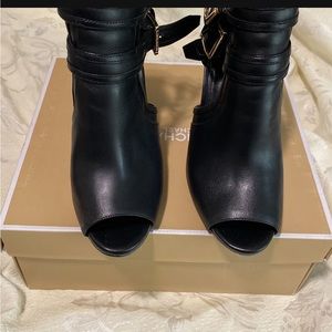 Michael Kors black used shoes… Size 7 in good condition no scratches